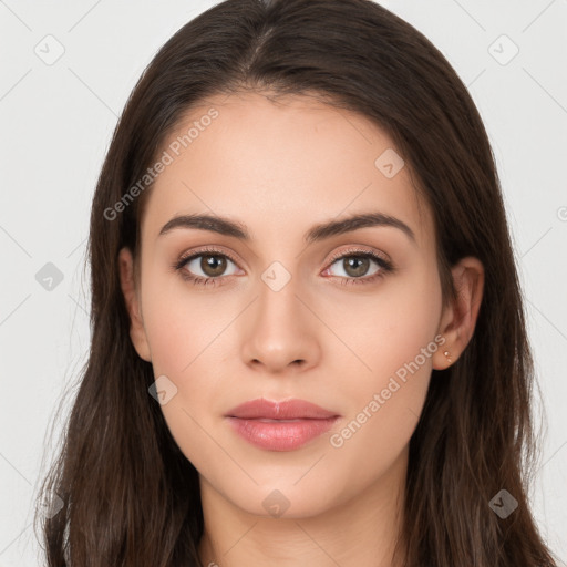 Neutral white young-adult female with long  brown hair and brown eyes