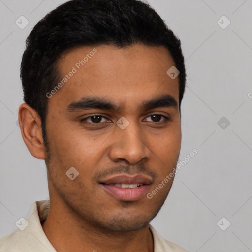 Joyful latino young-adult male with short  black hair and brown eyes