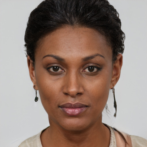 Neutral black young-adult female with short  brown hair and brown eyes
