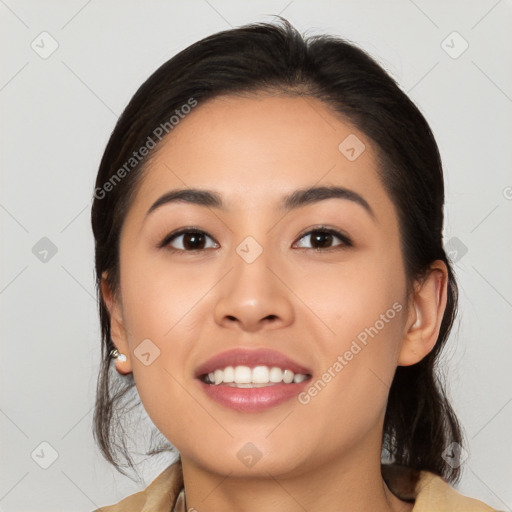 Joyful latino young-adult female with medium  black hair and brown eyes