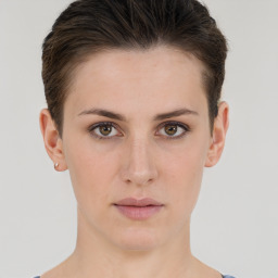 Neutral white young-adult female with short  brown hair and brown eyes