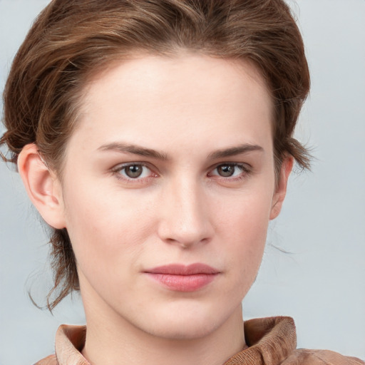 Neutral white young-adult female with medium  brown hair and grey eyes