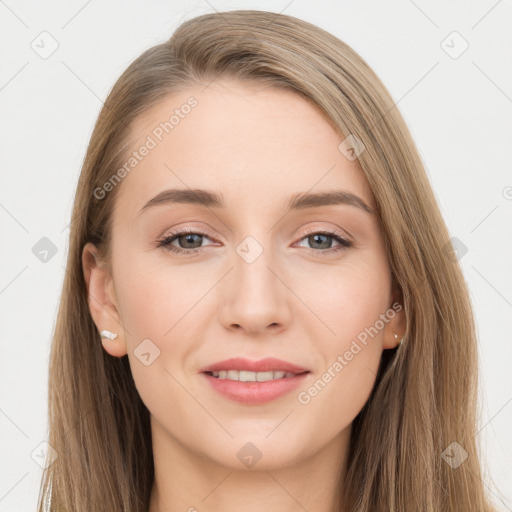 Joyful white young-adult female with long  brown hair and grey eyes