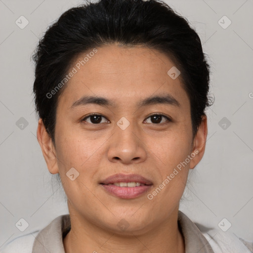 Joyful asian young-adult male with short  brown hair and brown eyes