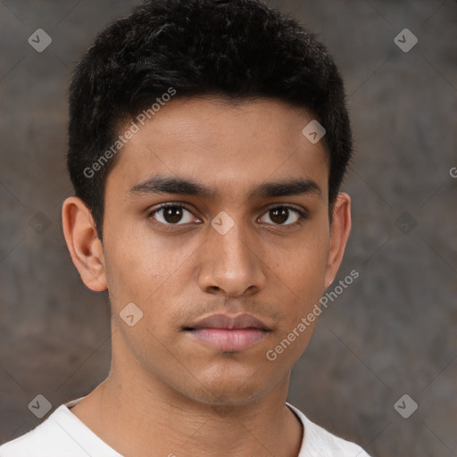 Neutral latino young-adult male with short  brown hair and brown eyes