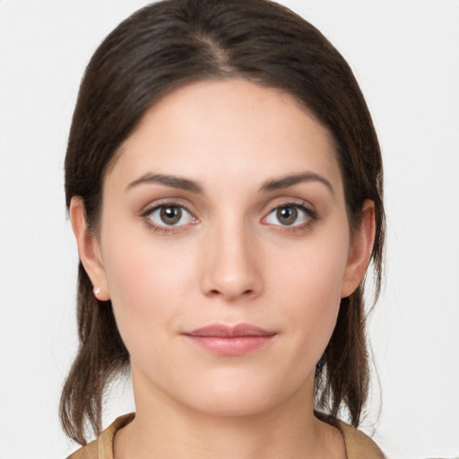 Neutral white young-adult female with medium  brown hair and brown eyes