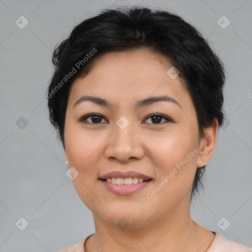 Joyful latino young-adult female with short  brown hair and brown eyes