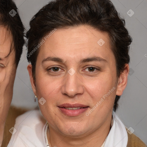 Joyful white adult female with medium  brown hair and brown eyes