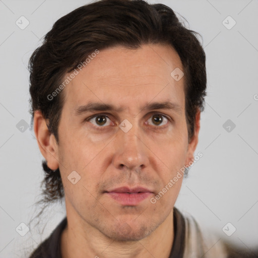 Neutral white adult male with short  brown hair and brown eyes