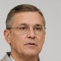 Neutral white middle-aged male with short  brown hair and brown eyes