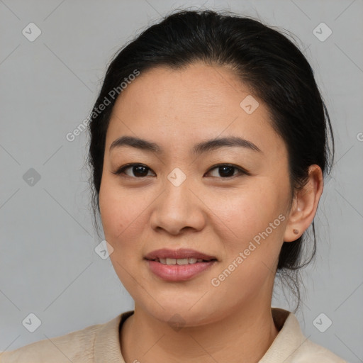 Joyful asian young-adult female with medium  black hair and brown eyes