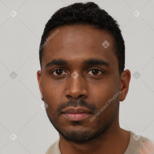 Neutral black young-adult male with short  black hair and brown eyes