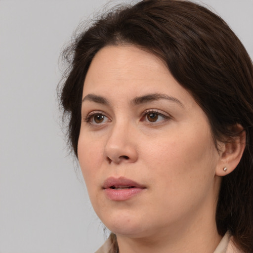 Neutral white young-adult female with medium  brown hair and brown eyes