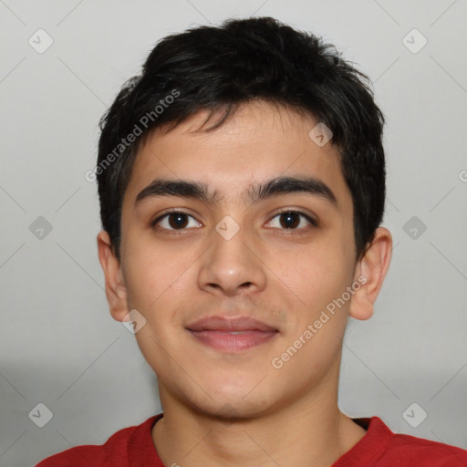 Joyful latino young-adult male with short  black hair and brown eyes