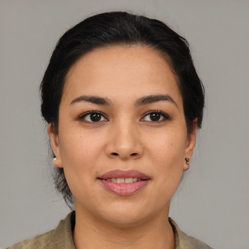 Joyful asian young-adult female with medium  brown hair and brown eyes