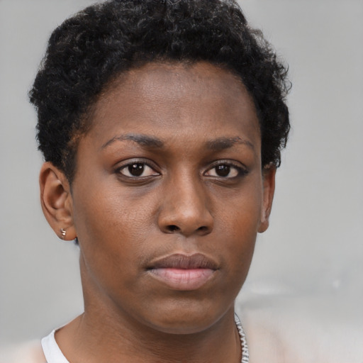 Neutral black young-adult female with short  brown hair and brown eyes