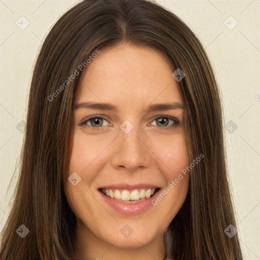 Joyful white young-adult female with long  brown hair and green eyes