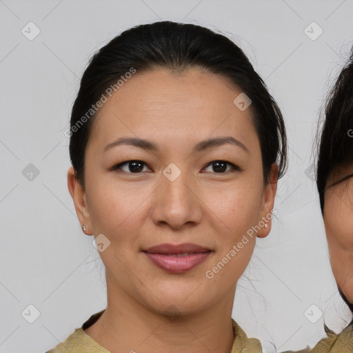 Joyful asian young-adult female with medium  brown hair and brown eyes