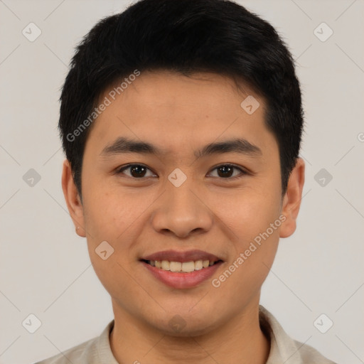 Joyful asian young-adult male with short  black hair and brown eyes