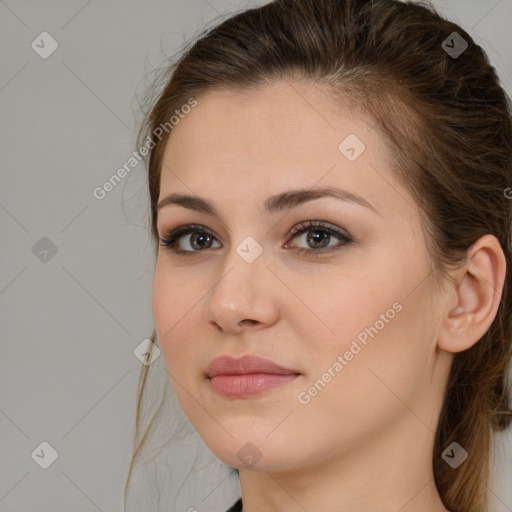 Neutral white young-adult female with medium  brown hair and brown eyes