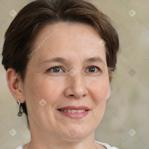 Joyful white adult female with medium  brown hair and brown eyes