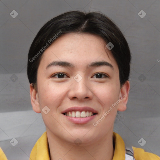 Joyful asian young-adult female with short  brown hair and brown eyes