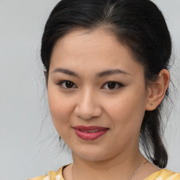 Joyful white young-adult female with medium  brown hair and brown eyes