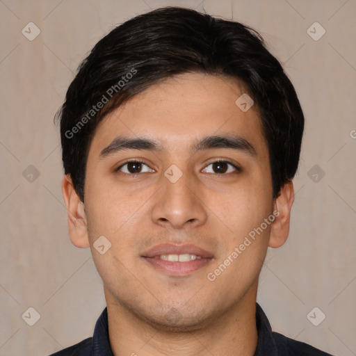 Joyful white young-adult male with short  black hair and brown eyes