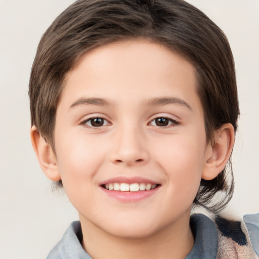 Joyful white child female with medium  brown hair and brown eyes