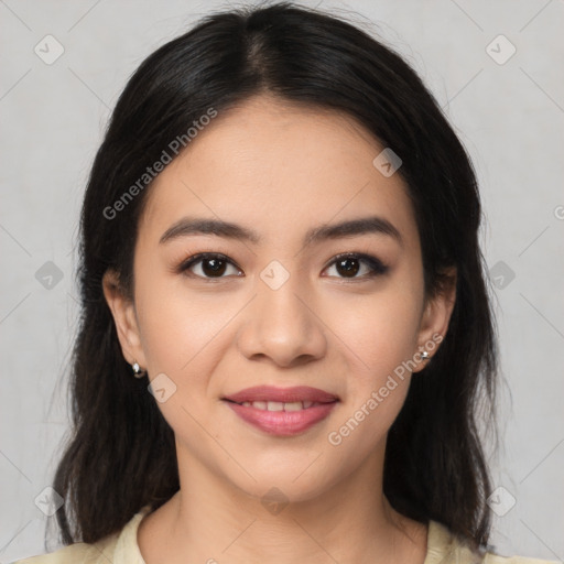 Joyful latino young-adult female with medium  brown hair and brown eyes