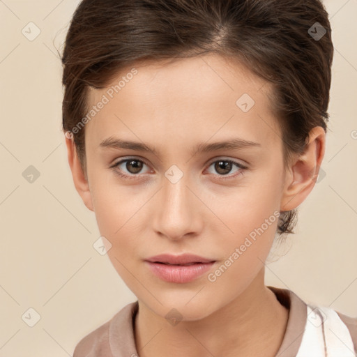 Joyful white child female with short  brown hair and brown eyes