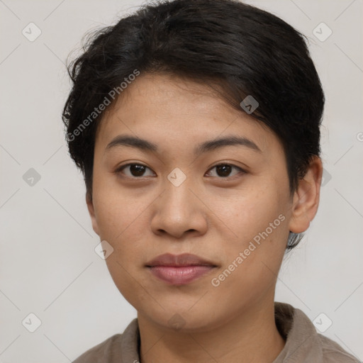 Joyful asian young-adult female with short  brown hair and brown eyes