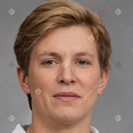 Joyful white adult female with short  brown hair and grey eyes