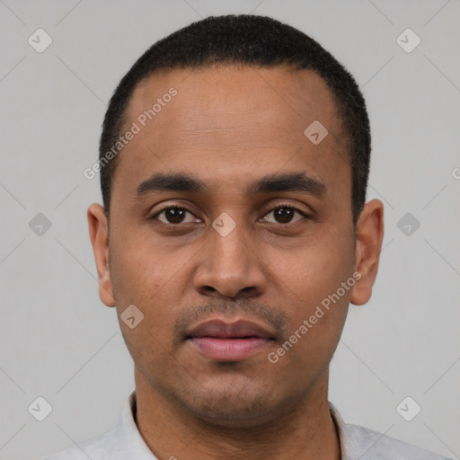 Neutral latino young-adult male with short  black hair and brown eyes