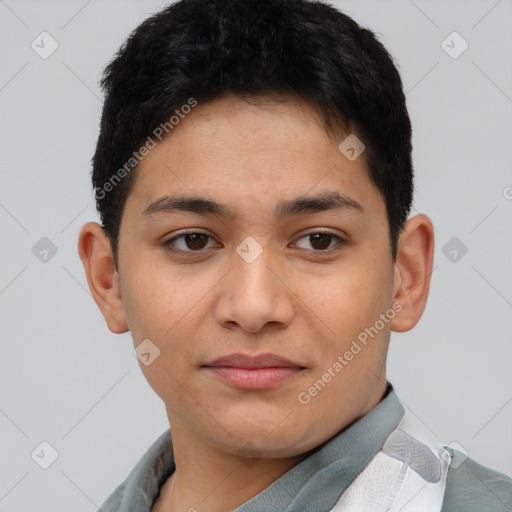 Joyful latino young-adult male with short  brown hair and brown eyes