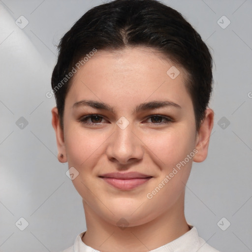 Joyful white young-adult female with short  brown hair and brown eyes