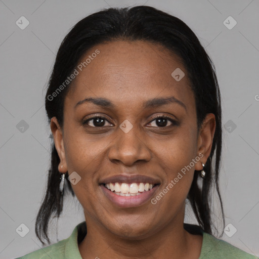 Joyful black young-adult female with medium  black hair and brown eyes