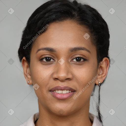 Joyful latino young-adult female with short  brown hair and brown eyes