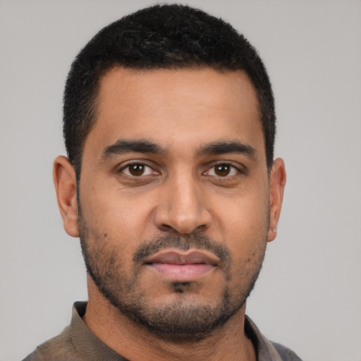 Neutral latino young-adult male with short  black hair and brown eyes