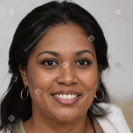 Joyful black adult female with medium  brown hair and brown eyes