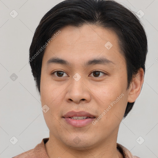 Joyful asian young-adult male with short  brown hair and brown eyes