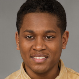 Joyful latino young-adult male with short  brown hair and brown eyes