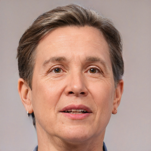 Joyful white middle-aged male with short  brown hair and grey eyes