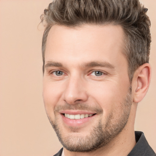 Joyful white young-adult male with short  brown hair and brown eyes