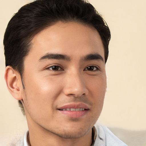 Joyful white young-adult male with short  brown hair and brown eyes