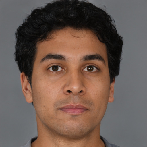 Neutral asian young-adult male with short  brown hair and brown eyes
