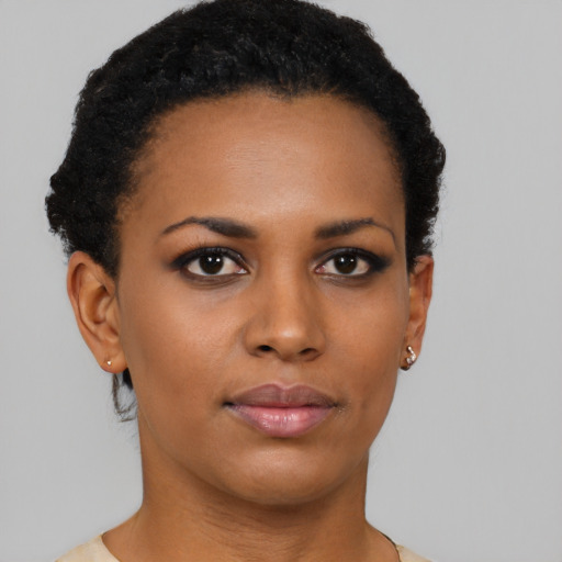 Neutral black young-adult female with short  brown hair and brown eyes