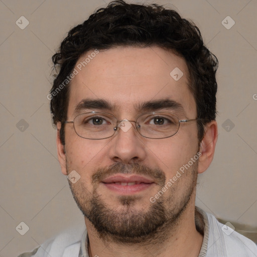 Joyful white adult male with short  brown hair and brown eyes