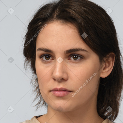 Neutral white young-adult female with medium  brown hair and brown eyes