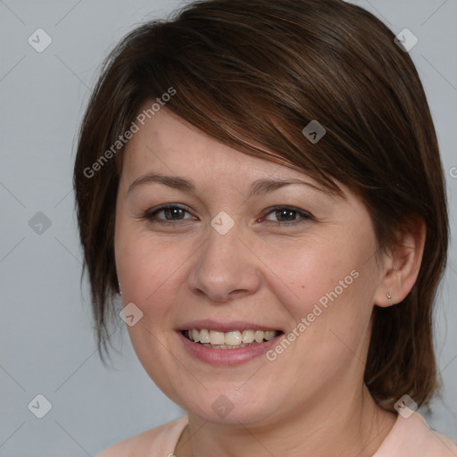 Joyful white young-adult female with medium  brown hair and brown eyes